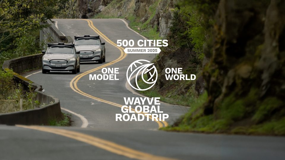 two vehicles driving down a winding road with the global road trip logo over the top of the image