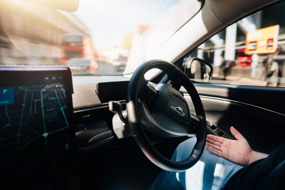 interior of a car with the steering wheel turning