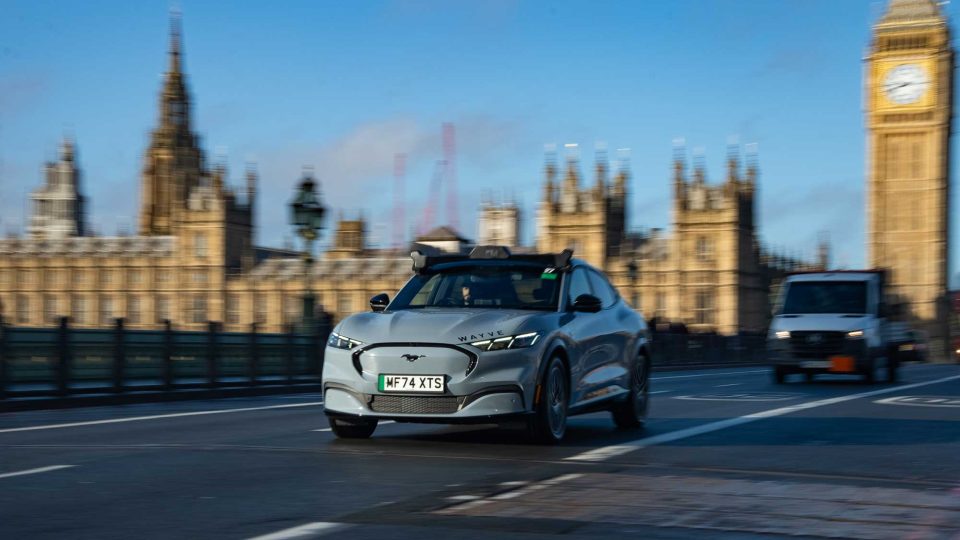 Wayve car crossing the bridge near the houses of Parliament in London